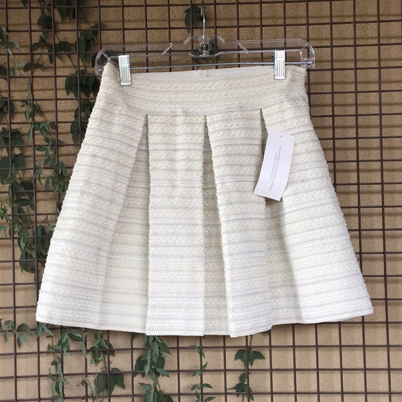 Daily Special Dresses & Skirts - 3/$20{Daily Special} NWT!! Size M Cream Mini Skirt